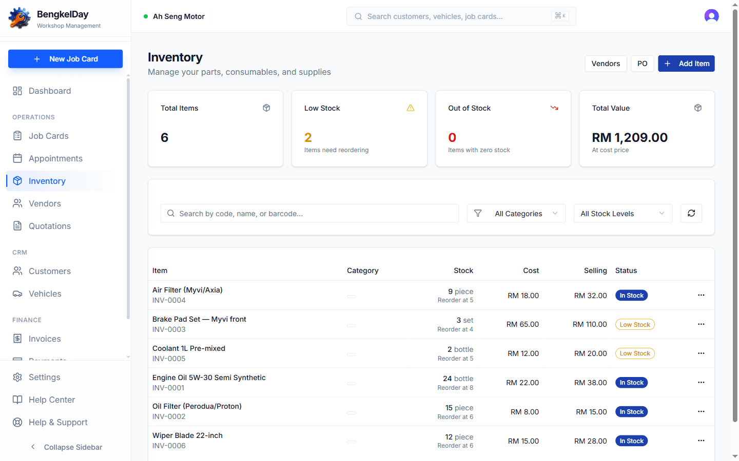 The BengkelDay inventory list showing total items, low stock and out of stock counts, total value, and items with In Stock and Low Stock badges